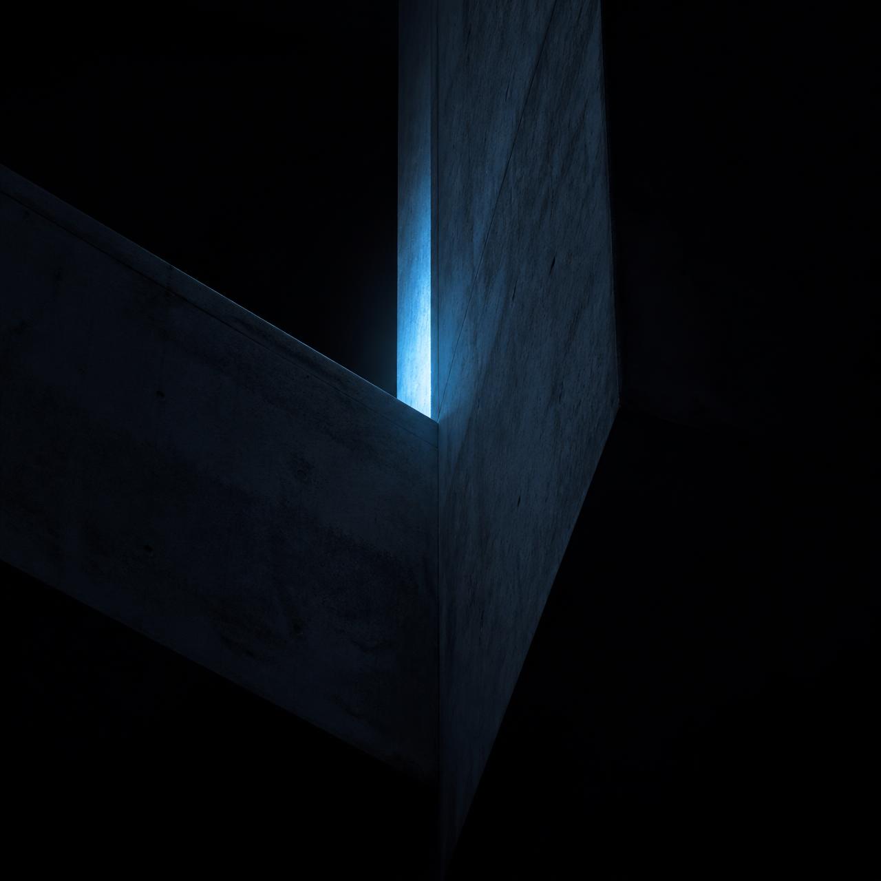 Concrete architectural edges lit by a narrow strip of cold blue light